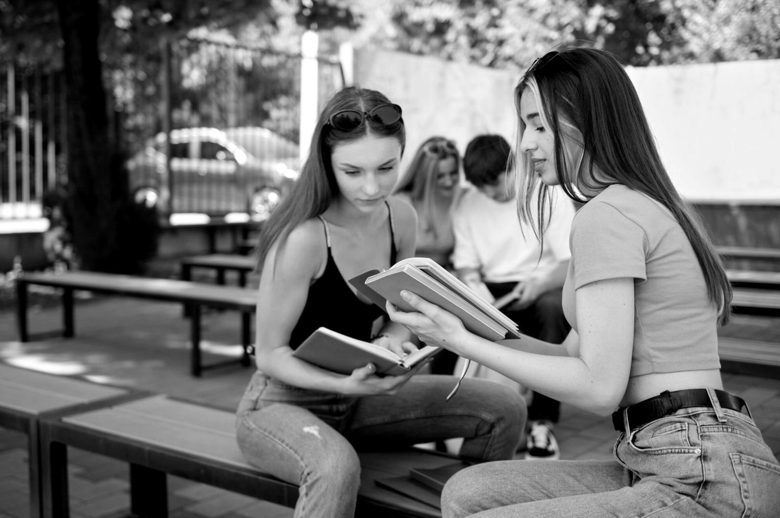 Professional reviewing complex financial models on multiple screens